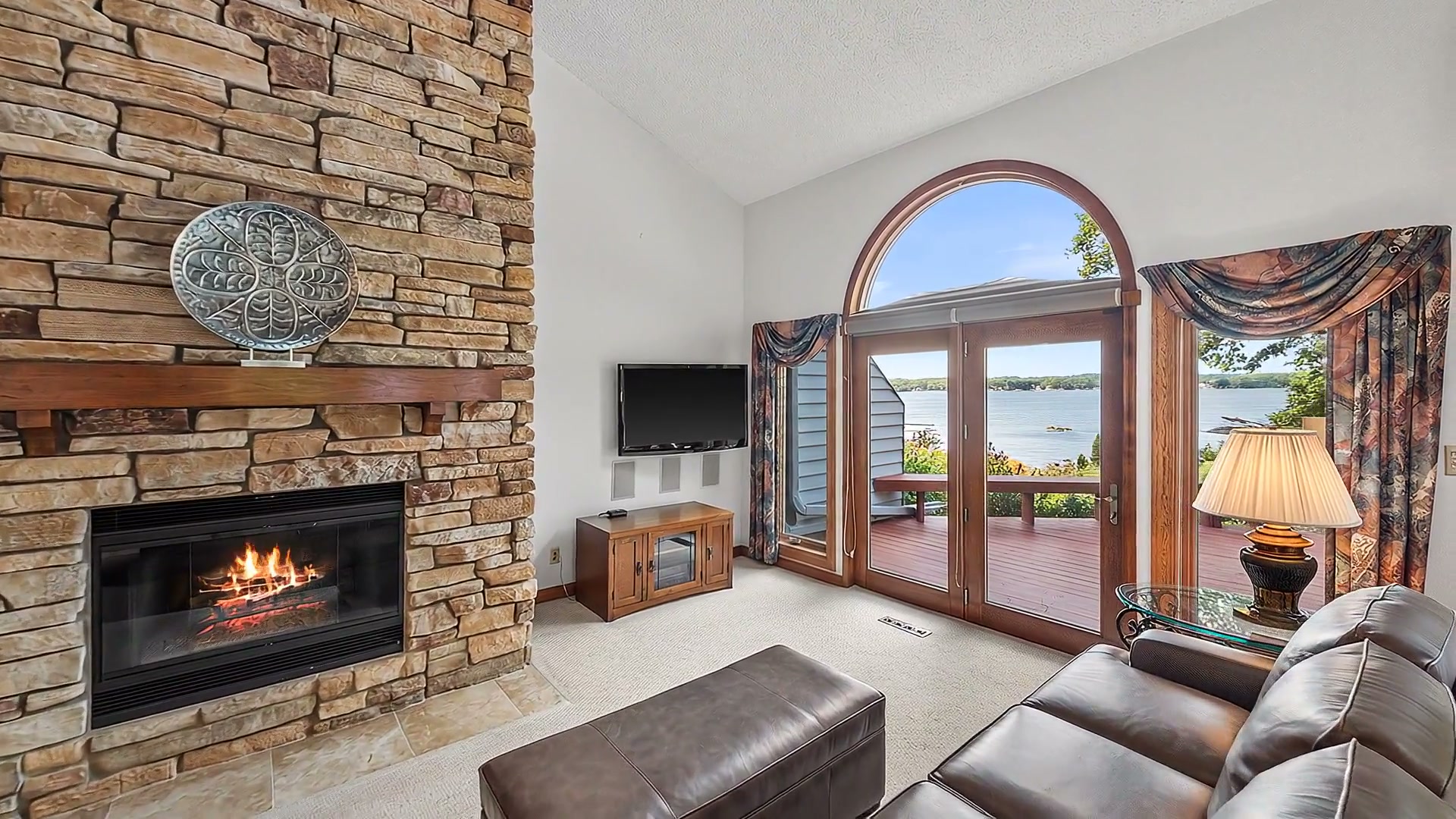 Harbor Circle's living room looking out onto the lake