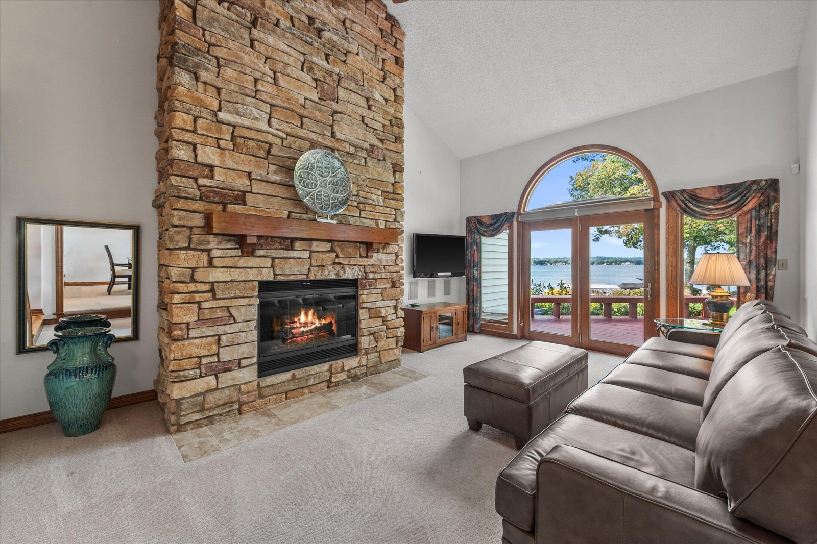 Original listing photograph of the Harbor Circle living room, before video production
